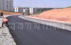 Первый слой асфальта начали укладывать на дублёре проспекта Гагарина